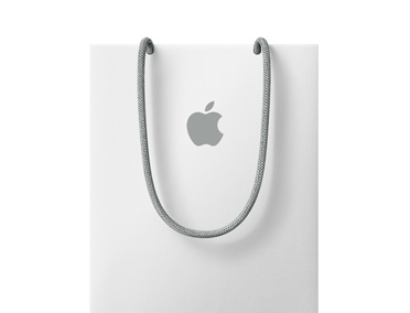 Fehér Apple-bevásárlótáska, a felső részén Apple-logóval