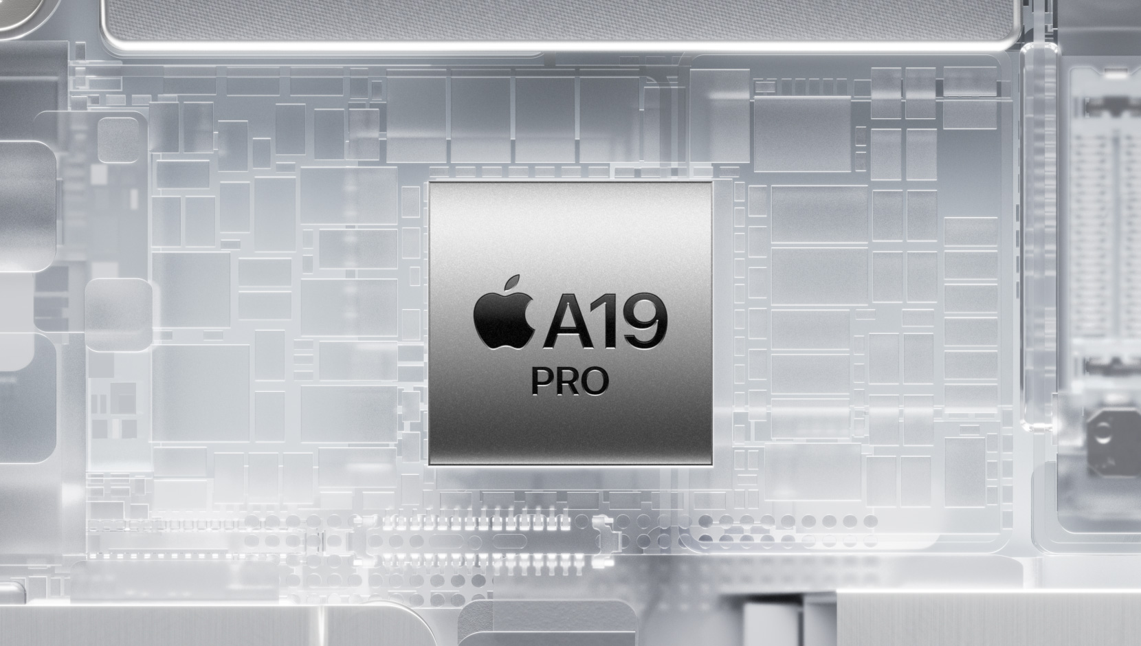 A19 Pro чип, заобиколен от светещи вътрешни iPhone компоненти